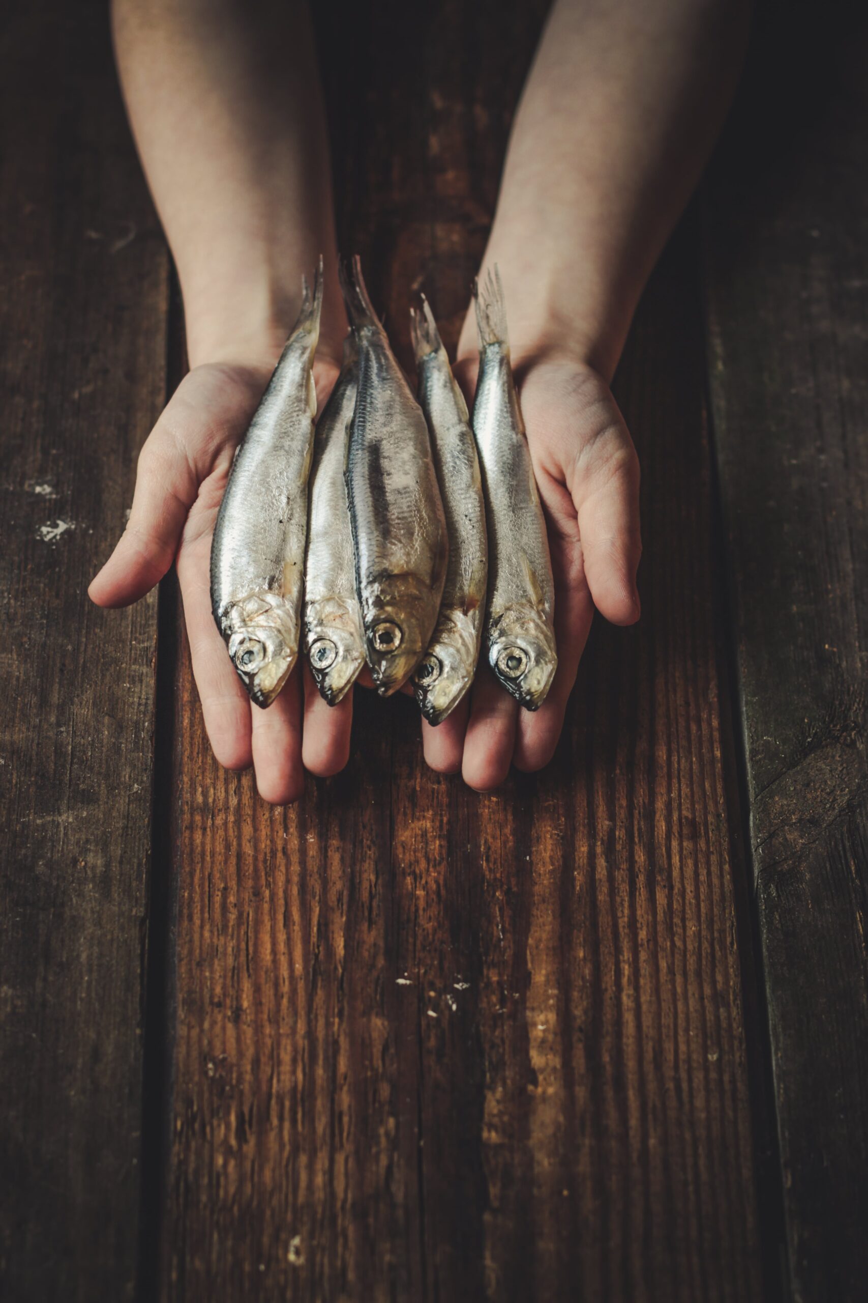 fish in hands